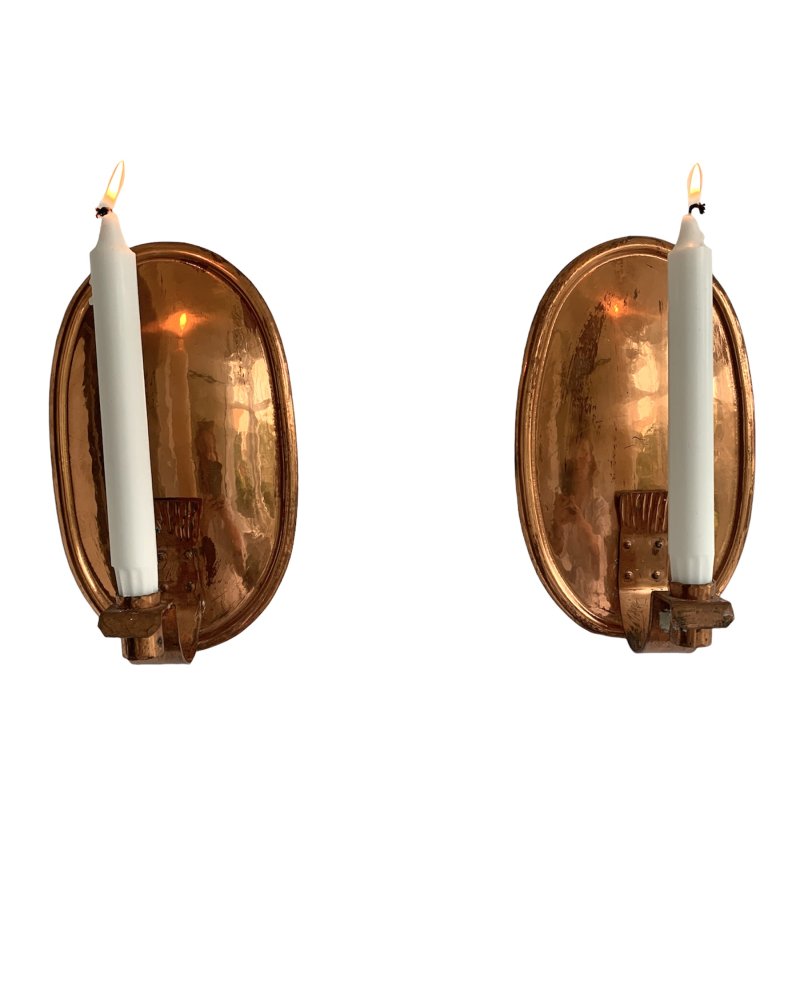 A pair of wall-mounted brass candlesticks A-1291